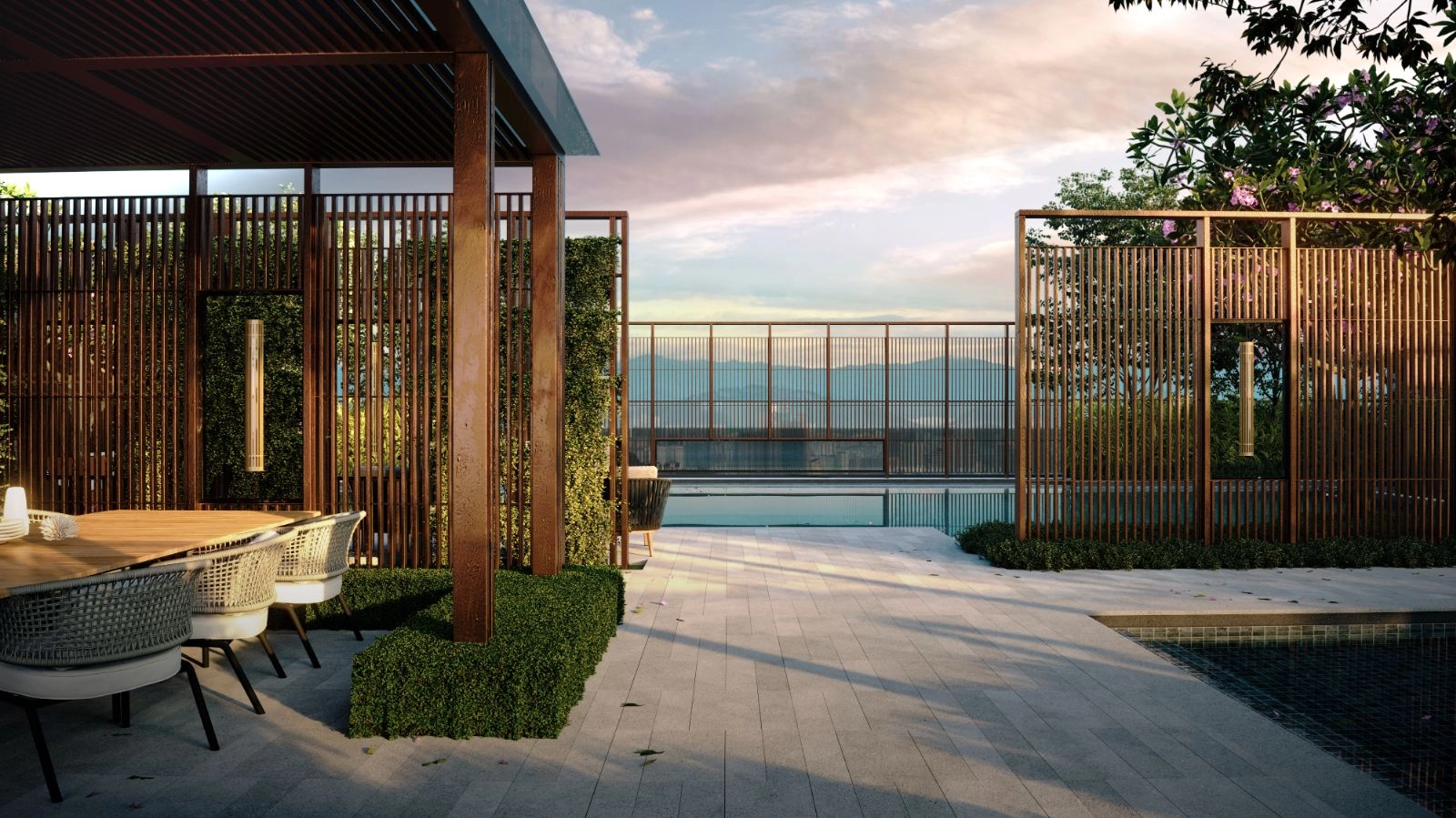 111 Menerung rooftop pool deck at sunset with outdoor dining pergola and Kuala Lumpur hill skyline view in Bangsar, Kuala Lumpur