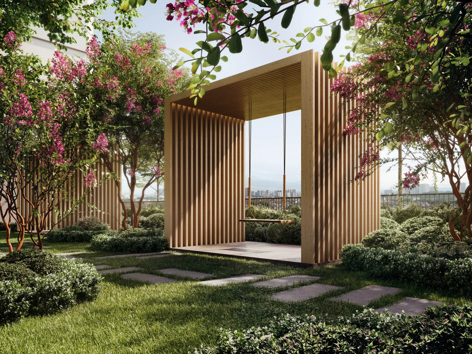 Aras Residence OUG garden swing pavilion facility surrounded by landscaped greenery and flowering tropical flora