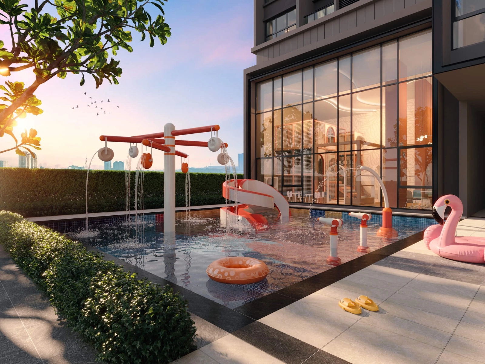Aricia Residences children's splash pool and play deck at sunset in Sungai Besi, Kuala Lumpur