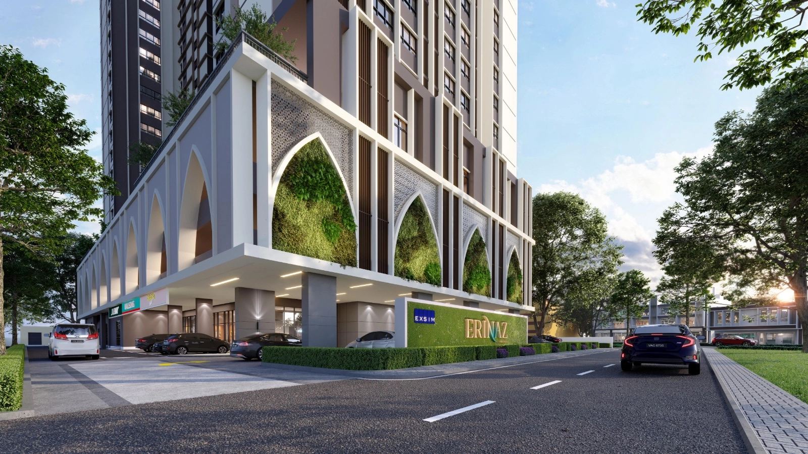 Erinaz Suites entrance podium with arched facade and signage in Kubang Kerian