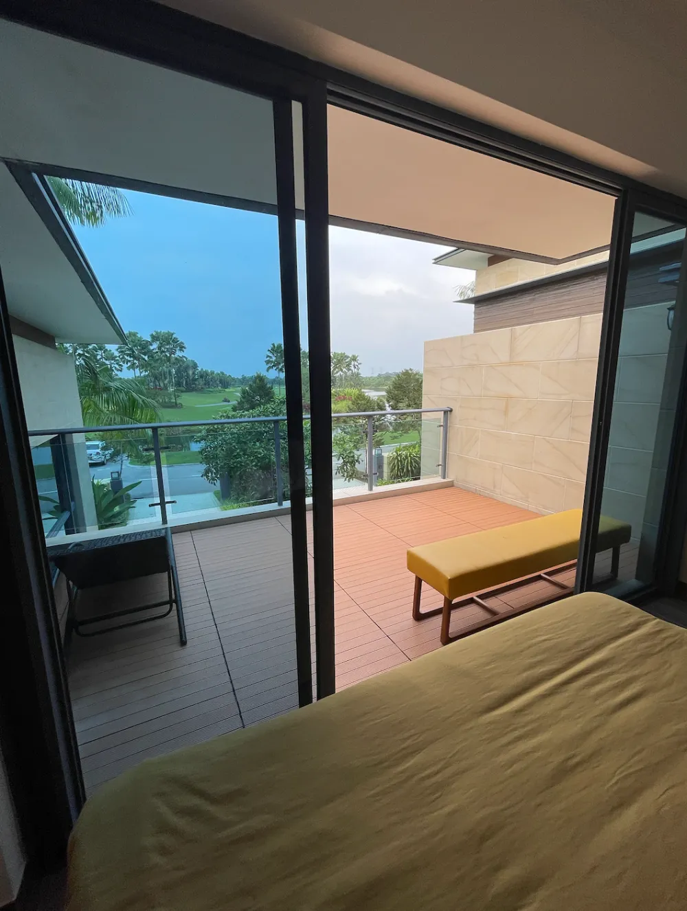 Forest City Golf Villa (Garden Terrace) Forest City Golf Villa bedroom opening onto a private balcony with golf course views in Forest City Golf Resort, Gelang Patah, Johor