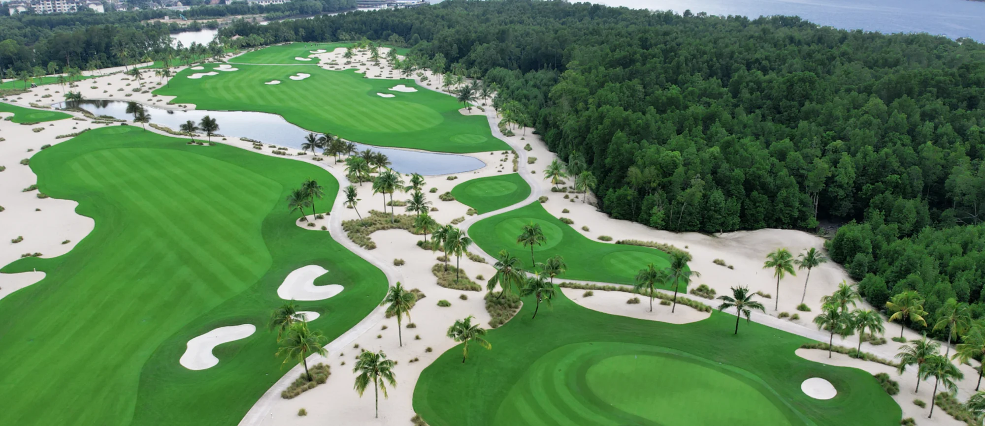 Forest City Golf Villa (Garden Terrace) Forest City Legacy Golf Course fairway and bunkers designed by Jack Nicklaus, bordering the mangrove reserve in Forest City Golf Resort, Gelang Patah, Johor