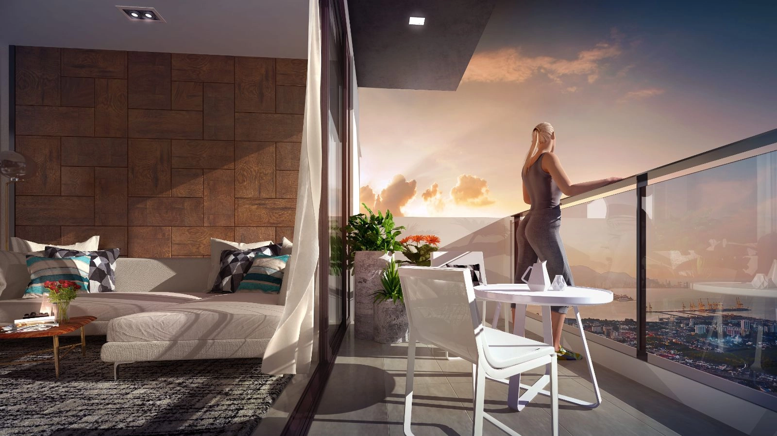 Ruang tamu dan balkoni unit pameran Gem Residence dengan pemandangan laut dan pelabuhan waktu senja
