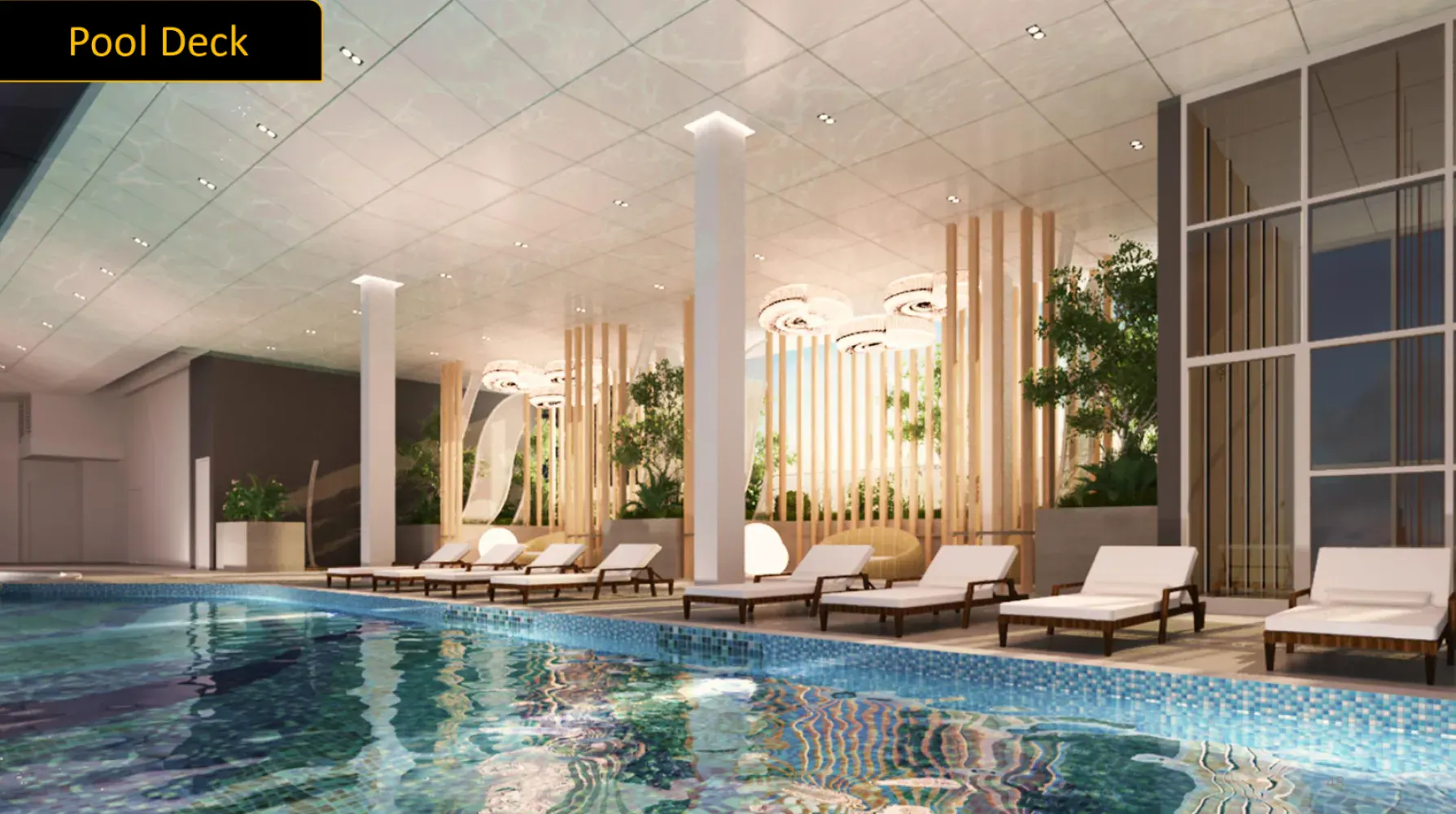 Golden Crown Residence indoor pool deck and lounge seating