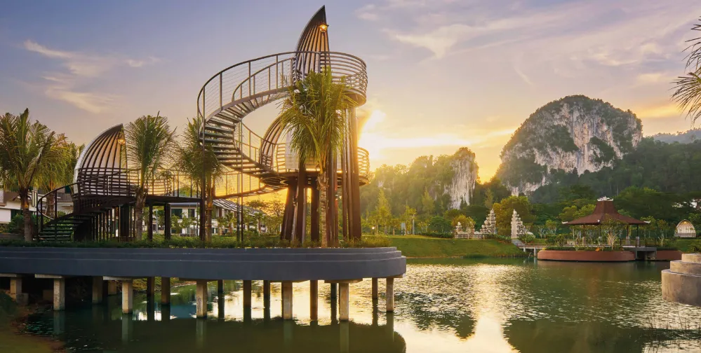 Jimbaran @ Gaia Gardens Link Villas Angkul Garden Balinese-themed spiral lookout tower and lakeside deck at Setia Eco Templer with Bukit Takun backdrop