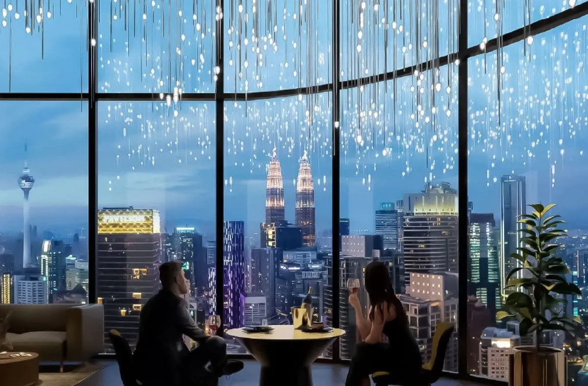 Orion Residence Moon Bar sky lounge dining area at dusk with Petronas Twin Towers view through floor-to-ceiling windows, from the official developer website in Bukit Bintang, Kuala Lumpur