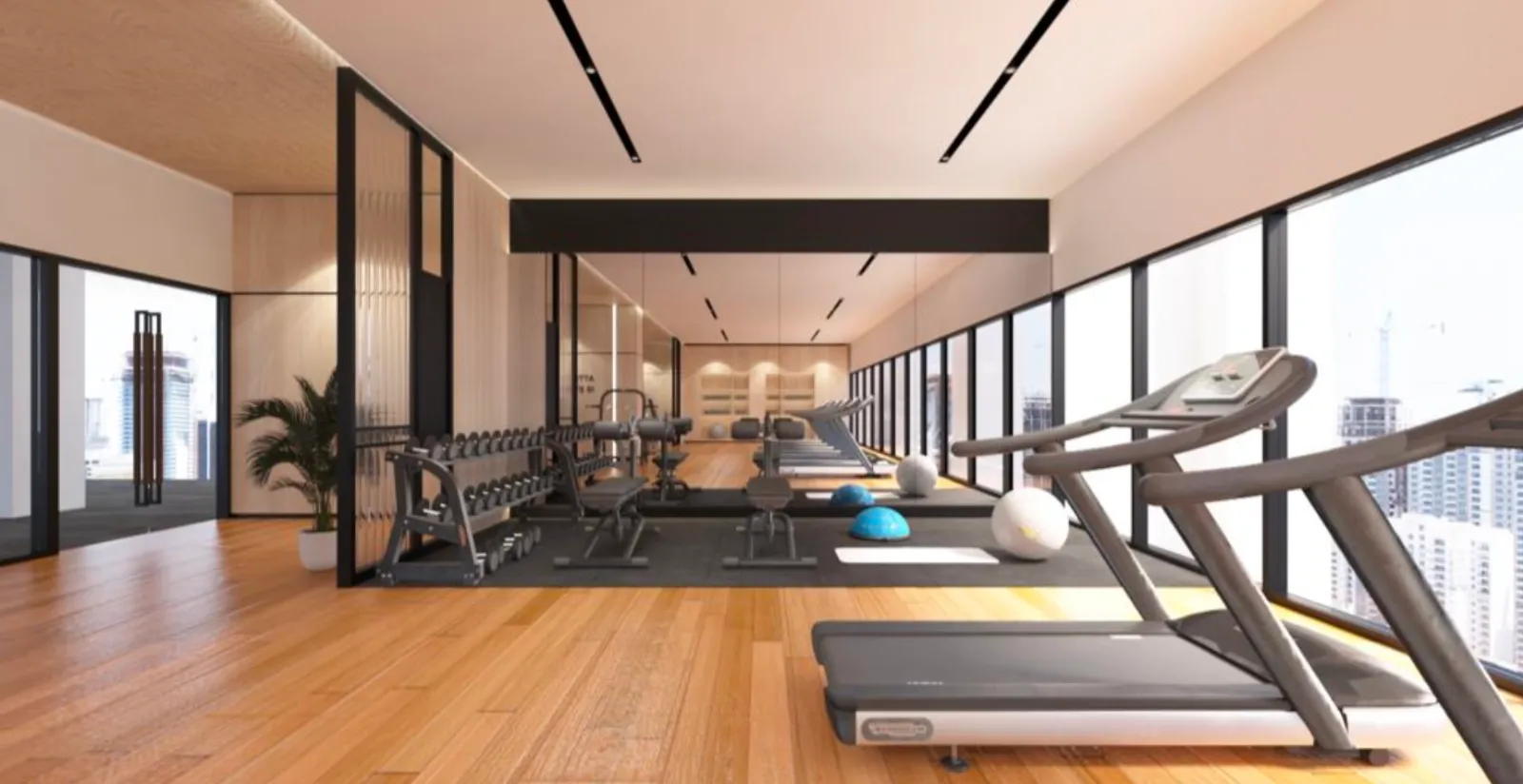 Paragon Signature Suites sky gym equipment area with floor-to-ceiling city views in Jalan Abdul Samad, Johor Bahru City Centre, Johor