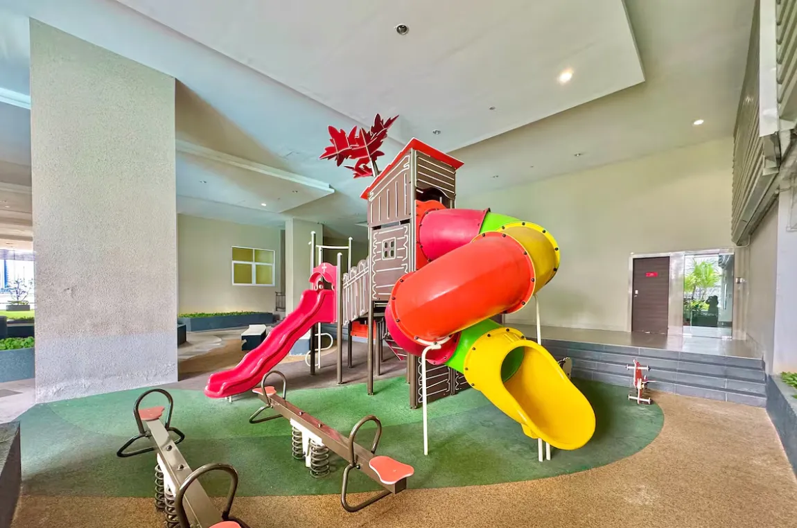 Paragon Suites @ CIQ indoor children's playground with tube slide and seesaws in Stulang Laut, Johor Bahru City Centre, Johor