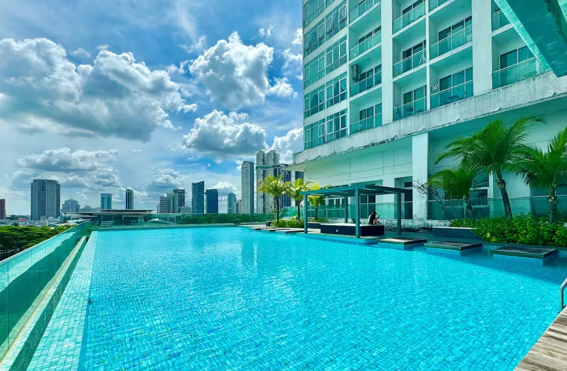Paragon Suites @ CIQ rooftop infinity-edge swimming pool with Johor Bahru city skyline view in Stulang Laut, Johor Bahru City Centre, Johor