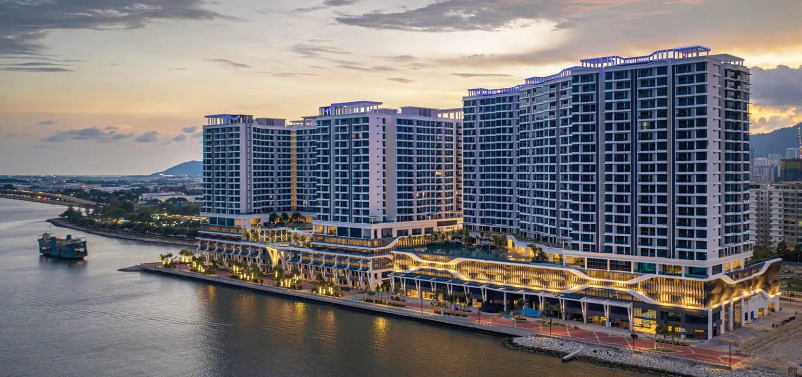 Queens Waterfront 3 (Q3) Aerial dusk view of Queens Waterfront township towers along the Penang coastline in Bayan Lepas, Penang