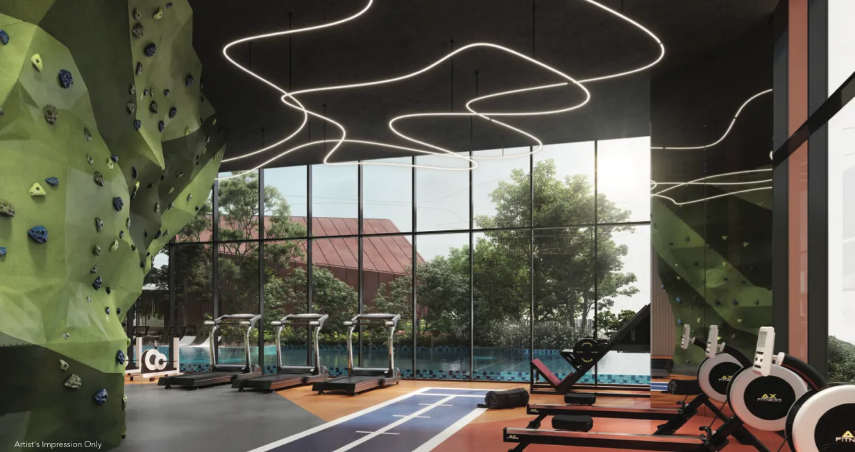 Residensi Bayu Damai indoor gymnasium with rock-climbing wall overlooking the podium pool in Kota Kinabalu