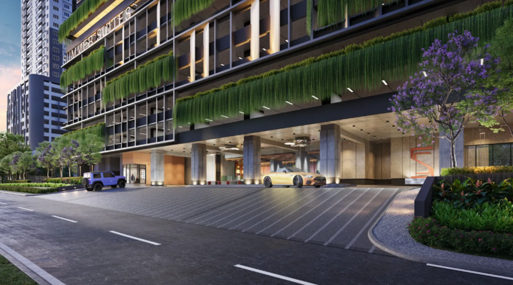 Pintu masuk drop-off aras bawah Summer Suites dengan landskap menegak hijau di atas porte-cochere
