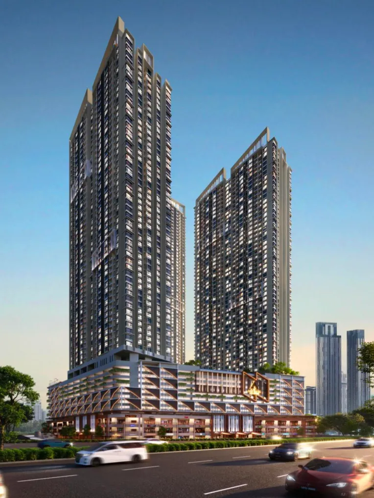 The Address @ Maxim Pelangi twin towers and retail podium viewed from the street at dusk in Johor Bahru in Jalan Serampang, Taman Pelangi, Johor Bahru, Johor