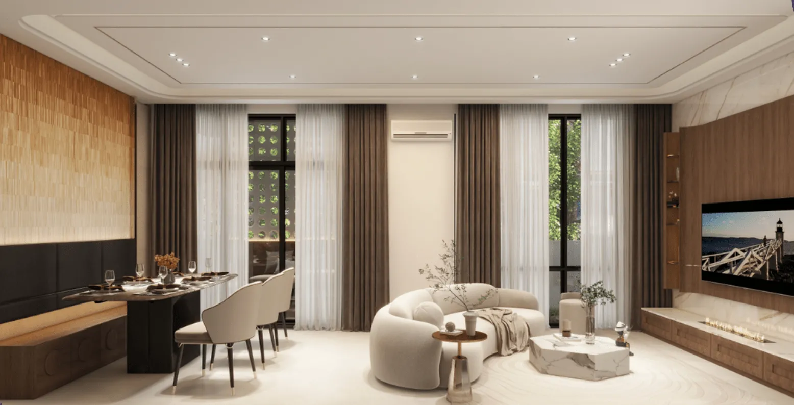 The Straits View Garden Permas Jaya Avina living and dining hall with curved sofa and full-height sheer curtains in Permas Jaya, Johor Bahru, Johor