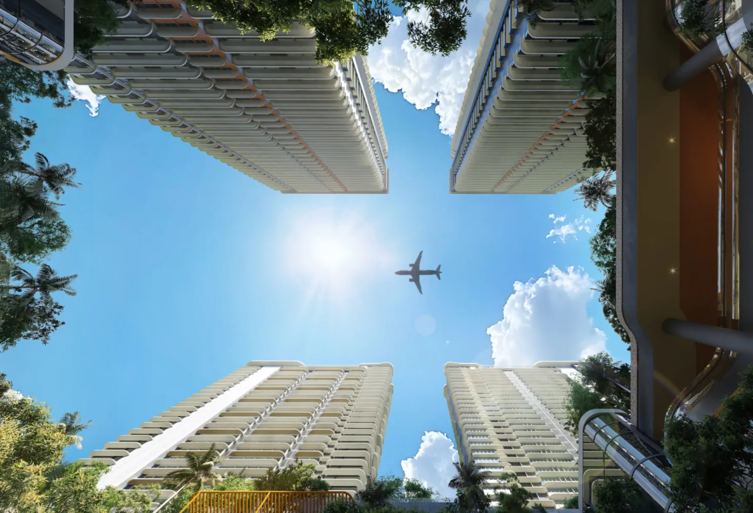 The V by Jesselton upward view of four residential towers framing the sky above the landscaped podium in Likas Bay, Kota Kinabalu, Sabah