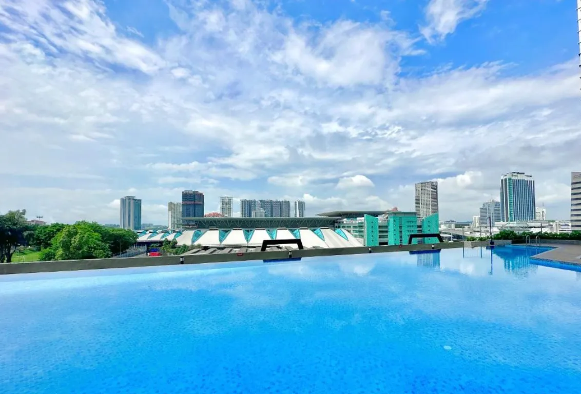 Twin Tower Residence wide-angle infinity pool view over Johor Bahru city skyline in Bukit Chagar, Johor Bahru, Johor
